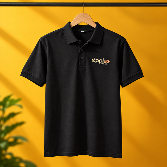 A black apple store printed staff Uniform Tshirt hanging on a yellow background